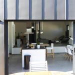 Renovation d'una maison avec extension zinc