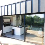 Renovation d'una maison avec extension zinc